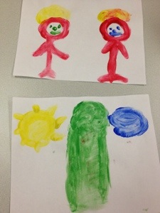 Miss N's paintings.  The top one is of her and her Mama, who is one of her heroes.  